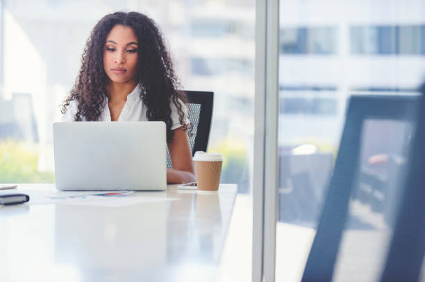 istock African American woman working on a laptop. 1020236234