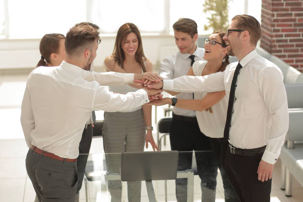 istock business colleagues folded their hands together 1020238770