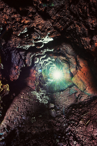Deep underground inside an abandoned mine shaft.
