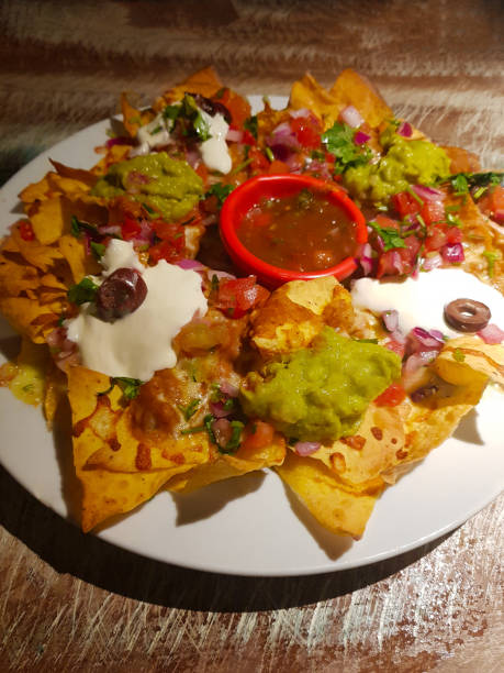 istock Mexican food: plate with tortillas, cheese, guacamole, cheese and sauces 1020248204
