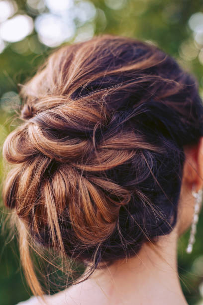 istock Girl with a simple hairdo view from behind 1020255690
