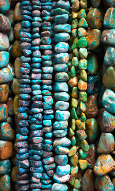 istock Turquoise Beads and Necklaces Hanging (Close-Up) 1020255940