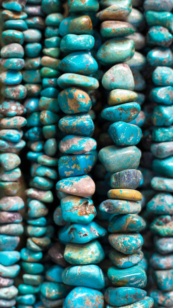 istock Turquoise Beads and Necklaces Hanging (Close-Up) 1020272466