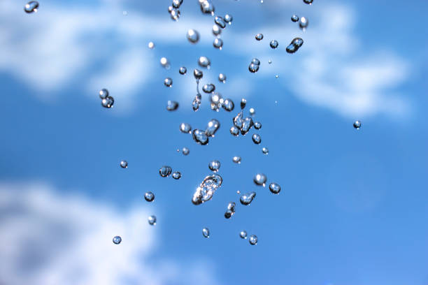 istock Close-up of water drops on glass surface as background 1020279072