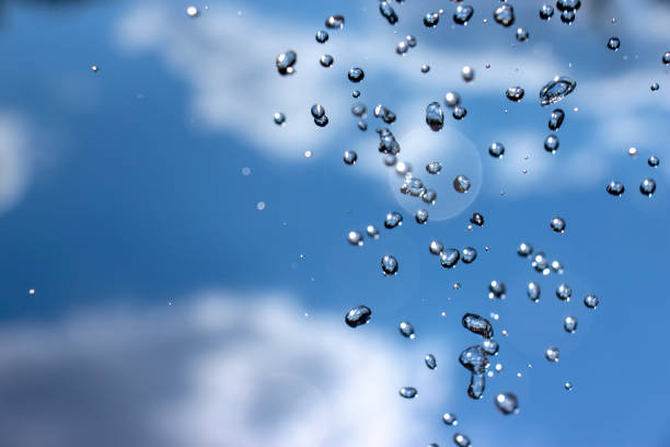 istock Close-up of water drops on glass surface as background 1020279086