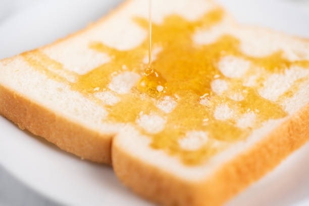 istock Sliced bread with honey topping 1020289264