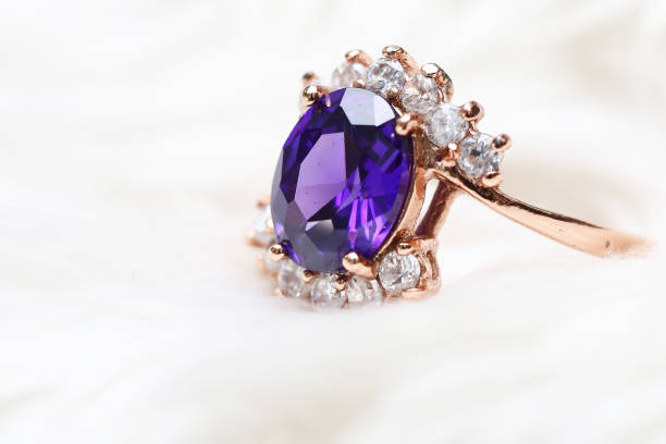 istock Purple gem stone on gold ring 1020294132