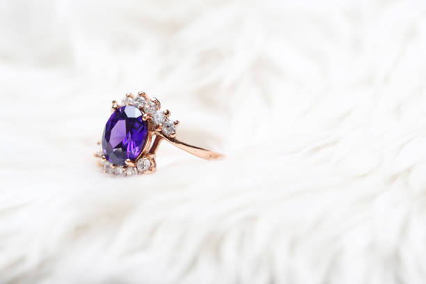 istock Purple gem stone on gold ring 1020294144