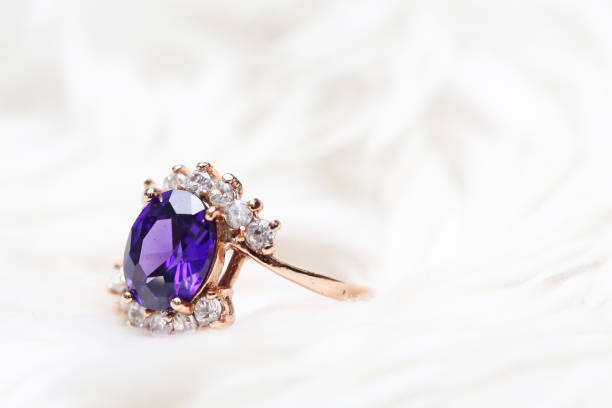 istock Purple gem stone on gold ring 1020294330