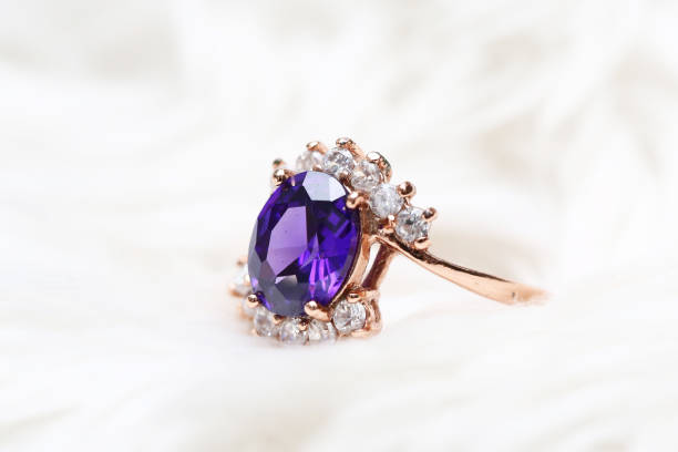 istock Purple gem stone on gold ring 1020294346