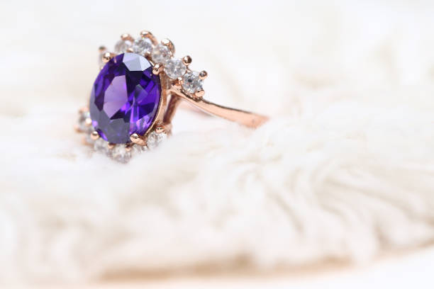 istock Purple gem stone on gold ring 1020294352