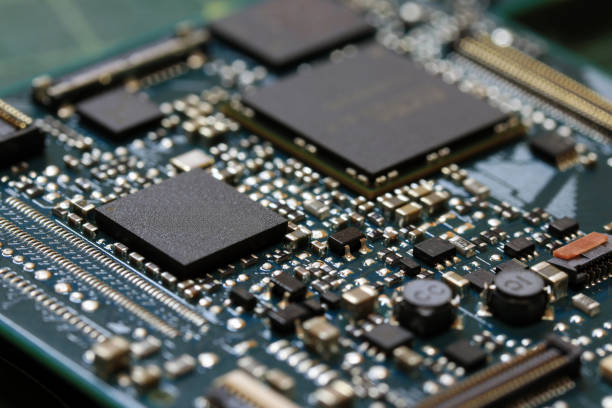 istock Electronics background technology close up of the green kit circuit board. 1020307288