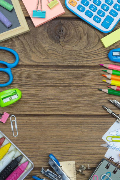 istock Ideal for back to school, education and  office work background concept. School supplies, stationery accessories on wood background. Top view with copy space. 1020320008