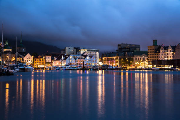 istock Dramatic sky during the very late blue hour over Bergen harbor in Norway 1020332436