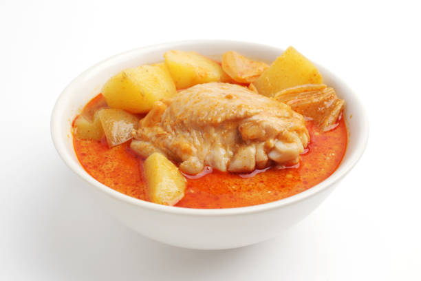 Thai style chicken mussaman curry white background