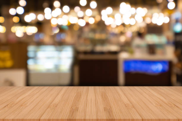 istock Perspective empty wooden table on top over blur background, can be used mock up for montage products display or design layout. 1020355782