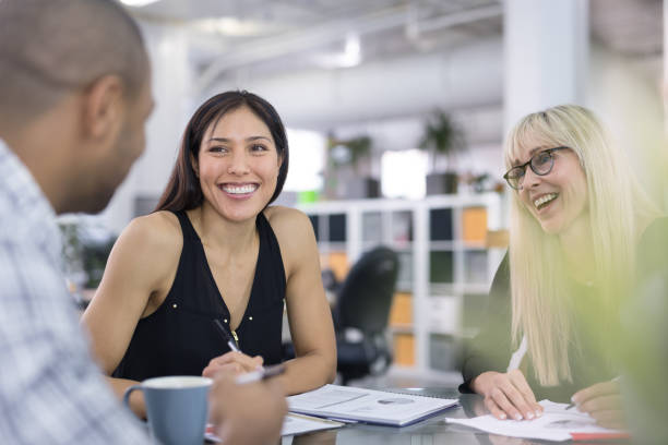 istock Ethnic female leads a business strategy meeting 1020356510