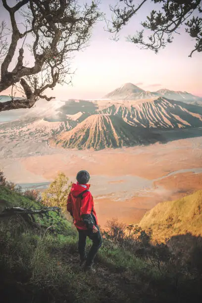 Traveler and sunrise at volcano Mt.Bromo (Gunung Bromo) Kingkong hill  East Java,Indonesia