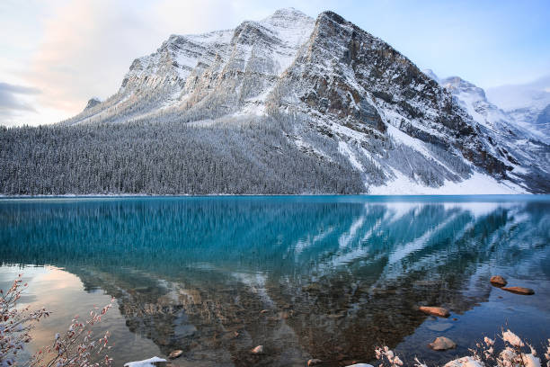 istock Lake Louise on a winter morning with a mountain range sprinkled with snow, Alberta, Canada 1020365634