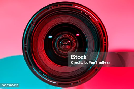 istock Front of lens camera and light shade color from two flash. 1020383026