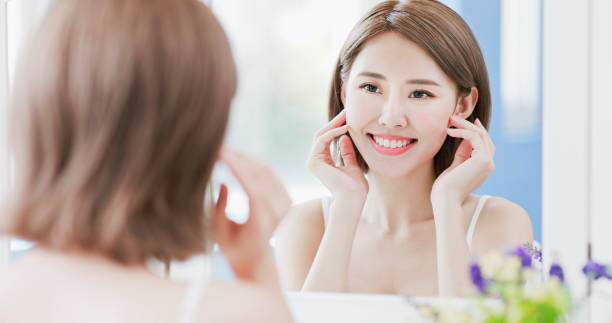 istock beauty woman touch her face 1020413294