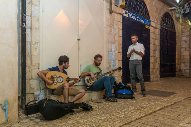 Klezmer Festival (2018) in Safed (Tzfat) Safed, Israel - August 14, 2018: Scene of the Klezmer Festival, with street musicians playing, in Safed (Tzfat), Israel. Its the 31st annual traditional Jewish festival in the public streets of Safed klezmer stock pictures, royalty-free photos & images