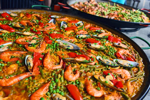 istock Spanish paella prepared in the street restaurant 1020428164