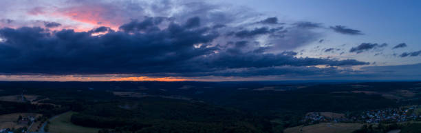 istock Panoramic aerial view over Rheingau-Tanus area, Germany at dusk 1020436432
