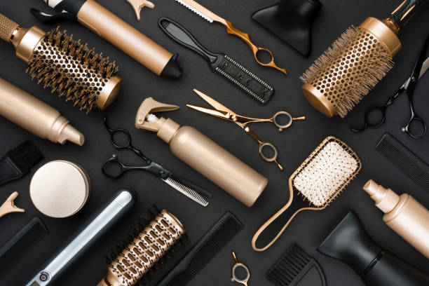 Full frame of professional hair dresser tools on black background Full frame of professional hair dresser tools on black background iron appliance photos stock pictures, royalty-free photos & images