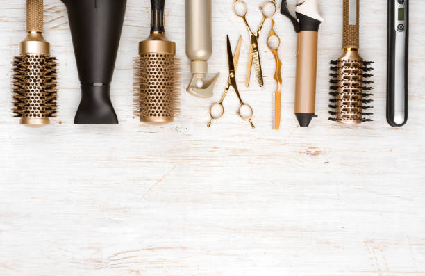 Professional hair dresser tools on wooden background with copy space Professional hair dresser tools on wooden background with copy space beauty salon stock pictures, royalty-free photos & images