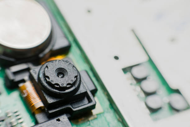 istock Close up camera inside electronic circuit board smart phone. disassembled cell phone parts. 1020439530