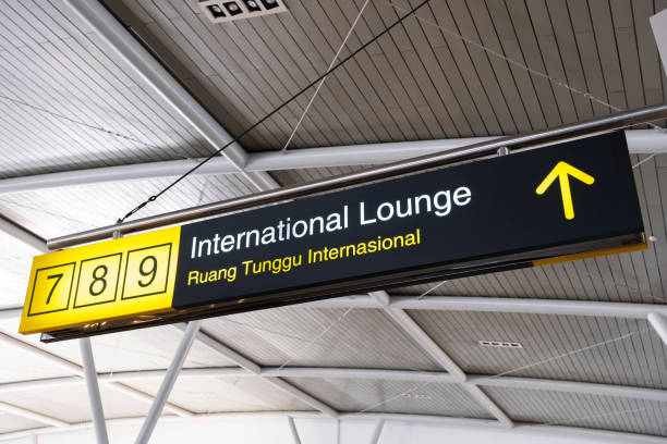 istock International gate or lounge information board in airport 1020439734