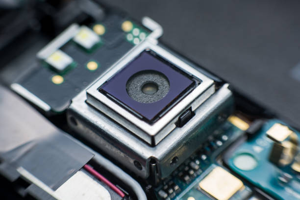 istock Close up camera inside electronic circuit board smart phone. disassembled cell phone parts. 1020444188