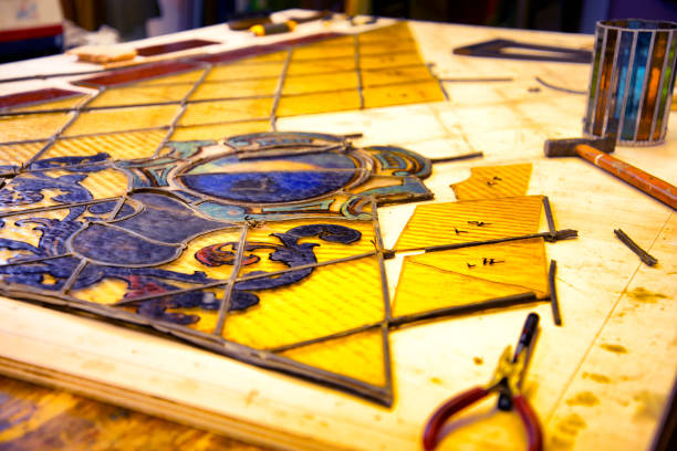 istock Old glass door restoring in master glazier workshop 1020444486
