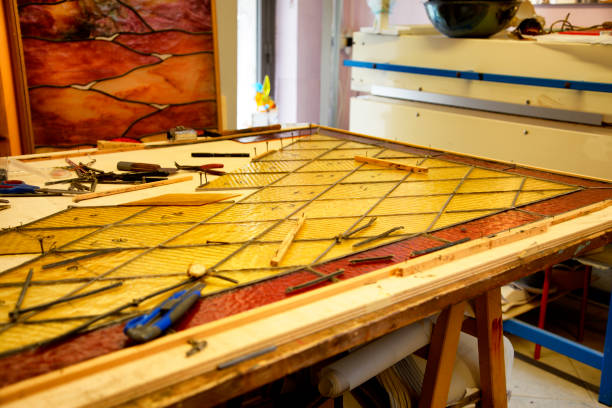 istock Old glass door restoring in master glazier workshop 1020444496