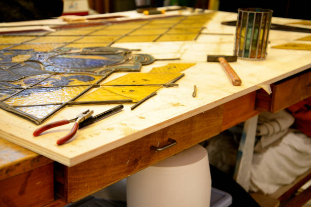 istock Old glass door restoring in master glazier workshop 1020444520