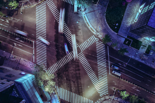 istock Aerial drone view on city intersection during night 1020448426