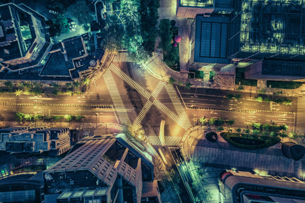 istock Aerial drone view on city intersection during night 1020448482