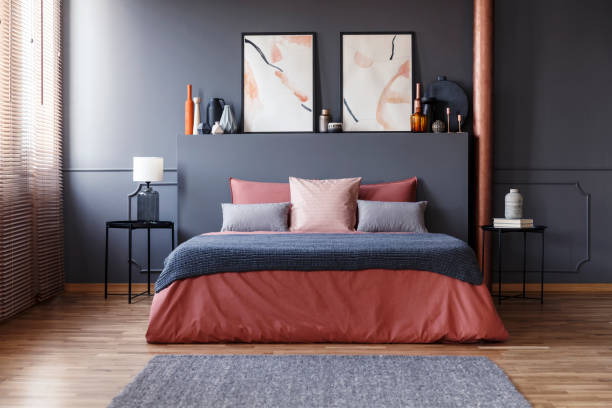 istock Grey and pink hotel bedroom 1020448494