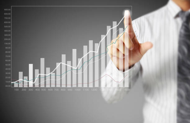 istock businessman with financial symbols coming 1020455842
