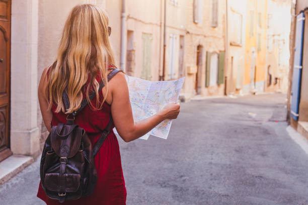 istock tourist with map, summer holidays travel 1020461080