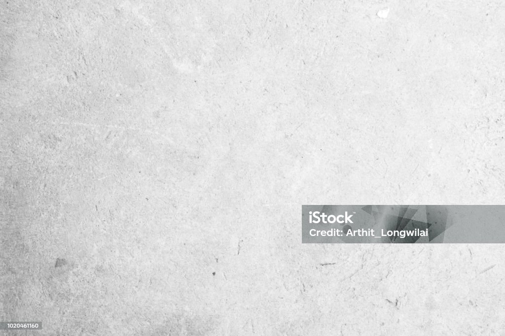 Modern grey paint limestone texture background in white light seam home wall paper. Back flat subway concrete stone table floor concept surreal granite quarry stucco surface background grunge pattern. Table Stock Photo