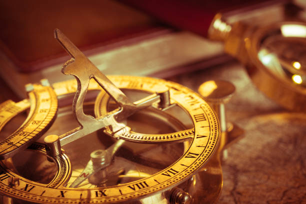 istock Old vintage compass and travel instruments on ancient map 1020461312