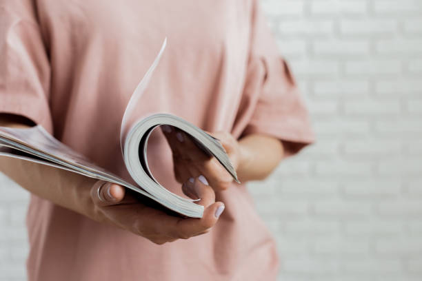 istock woman reading a magazine 1020461394
