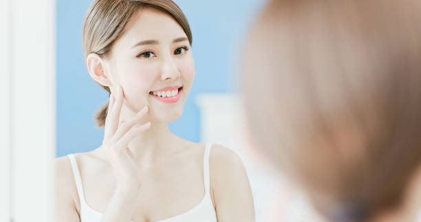 istock beauty woman touch her face 1020464382