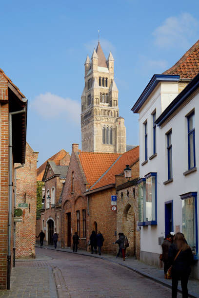 Bruges, Belgium, cityscape. The St. Salvator''s Cathedral. Bruges, Belgium February 23,2013: cityscape. The St. Salvator''s Cathedral. It is a city of amazing architecture and charm, one of the most picturesque in Europe. The heyday of the city in the middle Ages left a remarkable architecture and many attractions. Cathedral of St. Salvator or Cathedral of Christ the Saviour-the main Catholic Church in Bruges. It was built between XI and XV centuries. st salvator's cathedral stock pictures, royalty-free photos & images