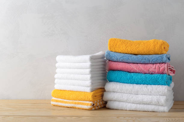 istock spa towels on wooden surface 1020471832