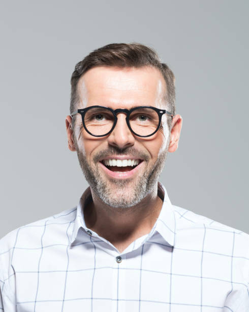istock Mature man smiling in glasses 1020474076