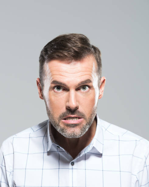 istock Mid adult man looking angry 1020474120