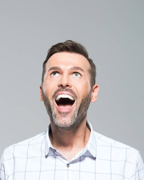 istock Laughing mature man looking up 1020474510